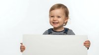Happy toddler boy with blonde hair holding blank white sign on white background isolated for design use.