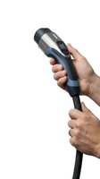 Professional handheld massage gun with digital display held by male hands on white background for muscle recovery and therapy equipment marketing.