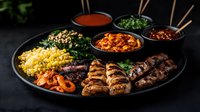 Grilled meat platter with assorted kebabs, rice, vegetables, and dipping sauces on dark background, perfect for restaurant menu or food delivery advertising.