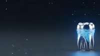 Futuristic dental crown with glowing blue light effects on dark starry background for medical technology presentations and healthcare marketing materials.