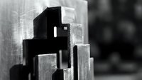 Geometric black and white architectural composition featuring stacked concrete blocks and angular forms creating abstract shadows and depth for modern design projects.