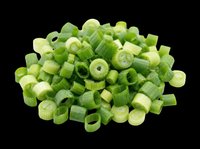 Fresh chopped green onions and scallions isolated on transparent background, ready for culinary design, recipe graphics, food packaging, cooking blogs, restaurant menus, and print-on-demand kitchen products.