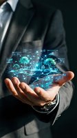 Businessman holding glowing digital ecosystem with trees, animals, and data charts, symbolizing green technology and sustainable innovation concept.