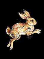 Decorative jumping rabbit with ornamental patterns in warm golden and brown tones, isolated on transparent background. Ready for t-shirt design, clipart, stickers, sublimation and print-on-demand projects.