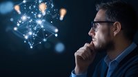 Caucasian businessman in glasses contemplating innovative ideas with glowing network and light bulbs, symbolizing creative thinking and digital transformation.