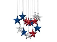 Hanging star ornaments in red, blue, and silver glitter finish arranged in cluster formation on white background, isolated and ready for holiday design, greeting cards, and festive decorations.