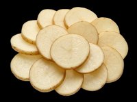 Fresh raw potato slices arranged in a pile, isolated on transparent background. Ready for food packaging, stickers, print on demand, clipart, and T-shirt design use.