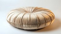 Round beige velvet floor cushion with tufted pleated texture, isolated on white background, perfect for interior design and home decor projects.