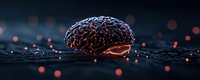 Glowing digital brain on dark surface with scattered red light particles and bokeh effects, representing artificial intelligence and neural networks.