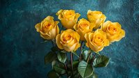 Vibrant yellow roses bouquet against textured teal background, creating dramatic contrast for romantic occasions, celebrations, or floral design projects.