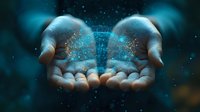 Magical glowing blue particles floating above cupped hands against dark background, creating mystical ethereal effect with sparkles and light dust in night atmosphere.