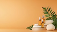 Minimalist spa composition with amber glass dropper bottles, white stones and tropical leaves on beige background. For wellness and cosmetic advertising.