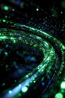 Glowing green and blue light trails curve through dark space with sparkling particles and bokeh effects creating futuristic technology atmosphere.