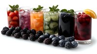 Fresh berry-infused drinks in clear glasses garnished with mint leaves and citrus, lined up with fresh blackberries and blueberries scattered in front, on white background.