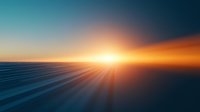 Dramatic sunset horizon over ocean with golden sunburst and light rays creating perspective lines across dark blue waters, atmospheric dusk scenery.