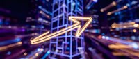 Golden arrow pointing upward through futuristic digital cityscape with neon lights and motion blur effects representing growth and progress in technology.