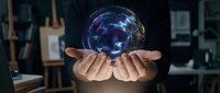 Hands holding glowing digital brain with neural networks in modern office workspace representing artificial intelligence and machine learning technology.