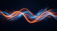 Abstract energy waves with glowing orange and blue light trails creating dynamic flowing motion against dark background for technology concepts.