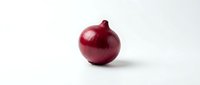 Fresh red onion with papery skin isolated on white background, suitable for food photography, culinary content, and grocery or recipe illustrations.