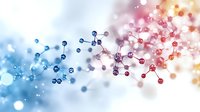 Colorful molecular structure with blue and red gradient atoms connected by bonds on blurred bokeh background, scientific concept for chemistry and biology.
