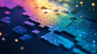 Illuminated computer keyboard in vibrant rainbow colors with bokeh light effects, creating futuristic tech atmosphere. Macro photography highlights keys texture and reflections.