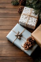 Wrapped Christmas presents with natural decorations, pine cones and evergreen branches on rustic wooden background. Eco-friendly holiday gift packaging.