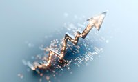 Glowing golden arrow chart breaking into particles against blue background shows business growth and success concept with dynamic movement effect.