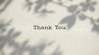 Thank you typed in vintage font on textured paper with soft floral shadows, evoking gratitude, elegance, and heartfelt appreciation for cards and invitations.