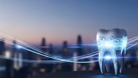 Digital tooth hologram with glowing blue light trails over blurred city skyline at dusk for dental technology and healthcare innovation concepts.