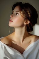 Young woman in white shirt gazing upward with dramatic lighting, bare shoulders and elegant updo hairstyle creating romantic atmospheric portrait.