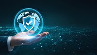 Businessman hand holding glowing globe with security shield and checkmark symbol representing global cybersecurity and data protection solutions.