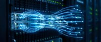 Digital fiber optic cable with glowing blue light streams transmitting data through server infrastructure for telecommunications and network technology.