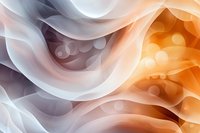 Abstract flowing waves in orange and white create soft ethereal background with glowing bokeh effect and gentle curves for modern design projects.