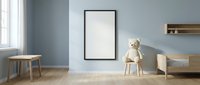 Modern minimalist children's bedroom interior with blank picture frame mockup on blue wall, wooden furniture and white teddy bear for design presentation.