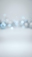 Soft gray bokeh background with sparkling lights and gentle blur effects for elegant design projects and presentations.