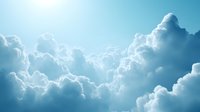 Dramatic sunlight breaking through majestic cumulus clouds in bright blue sky, creating ethereal atmosphere and natural light rays for spiritual backgrounds.