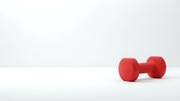 Red dumbbell weight on white background, isolated fitness equipment for gym, sports, and wellness design projects.