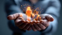 Glowing orange human silhouette floating above cupped hands with magical sparkles and light particles, representing spiritual energy and personal transformation.
