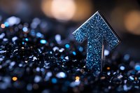 Glowing blue arrow pointing upward emerges from dark crystalline surface with bokeh lights, representing growth, success and forward momentum in business.