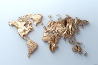 Golden textured world map relief on light background showing continental topography and geographical features with metallic surface finish.