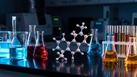 Laboratory glassware with colorful chemical solutions and molecular structure model on dark surface for scientific research and education.
