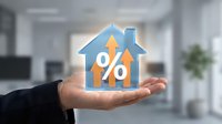 Business professional holding house icon with percentage symbol representing mortgage rates, real estate investment, home loan interest concepts for financial services.