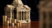 Classical bank building with golden coins stacks representing financial institution, banking services, investment and monetary system for business concepts.