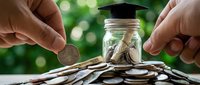 Hands placing coins around glass jar with graduation cap and money inside, symbolizing education savings and investment in future learning goals.
