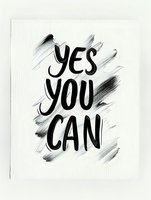 Motivational black brush lettering "Yes You Can" on white textured paper with dynamic gray brushstrokes creating movement and energy around positive message.