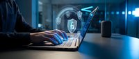 Cybersecurity professional working on laptop with digital security shield icons and lock symbols in modern office environment for data protection concepts.