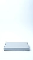 Empty open cardboard box with white lid and gray base isolated on white background, ready for product display, packaging design, and e-commerce mockups.