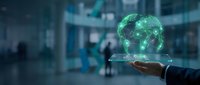 Businessman holding glowing green holographic Earth globe in modern office environment showcasing global business technology and environmental sustainability concepts.