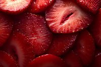 Fresh sliced strawberries in macro view showing juicy red flesh and natural texture, perfect for food packaging, recipe blogs, and summer dessert promotions.