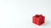 Red gift box with ribbon bow on white background, suitable for holiday, celebration, and promotional marketing materials.